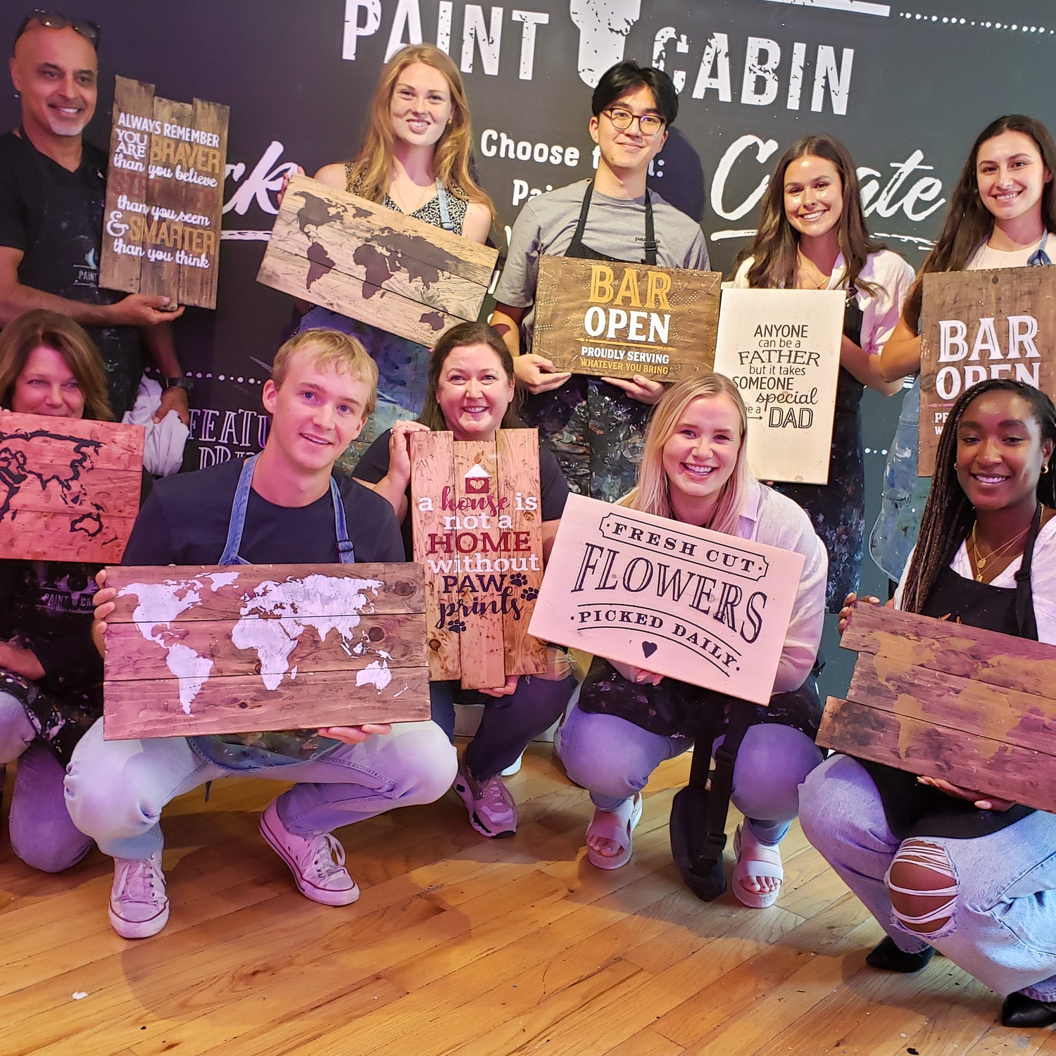 A Picture of a Group Enjoying a DIY Team Building Activity at Paint Cabin